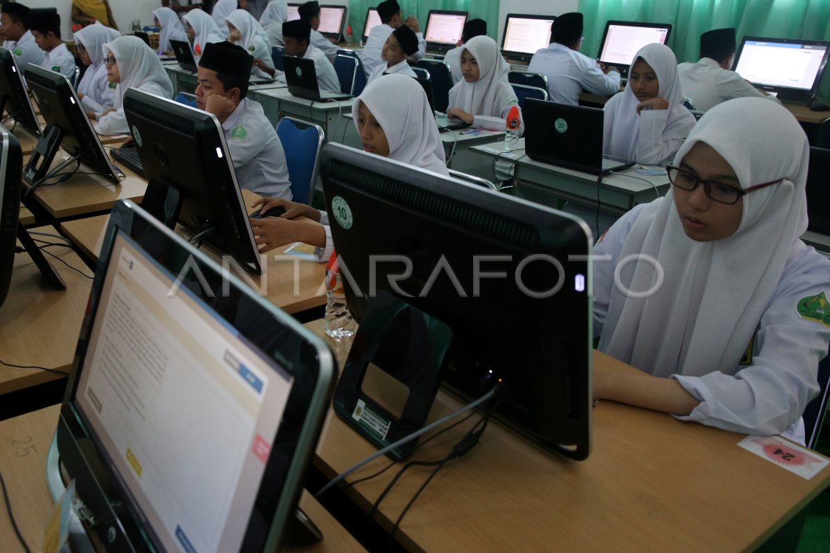 Un Berbasis Komputer Antara Foto