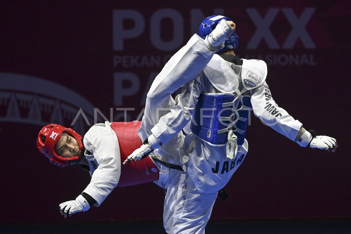 FINAL TAEKWONDO KYORUGI UNDER 54 KG PUTRA ANTARA Foto