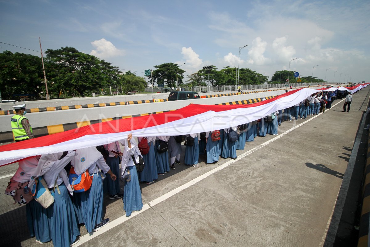 REKOR MURI BENDERA MERAH PUTIH TERPANJANG DI JEMBATAN SURAMADU | ANTARA ...